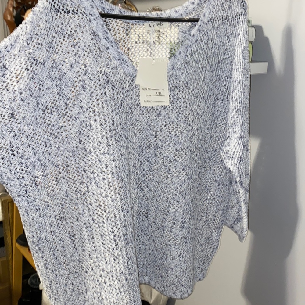 Oversized sweater. Off the shoulder